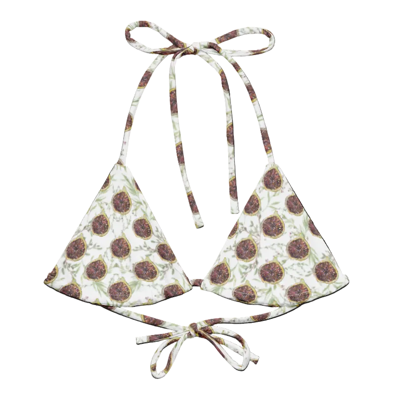 A triangle halter bikini top with a white base and a brown sunflower print, featuring adjustable tie straps at the top and side.